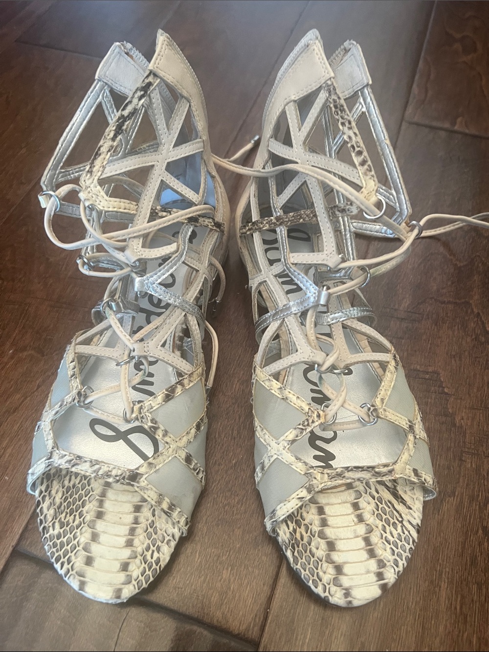 Sam Edelman
Lace-Up Heeled Sandals in Metallic Silver with Snake-Print